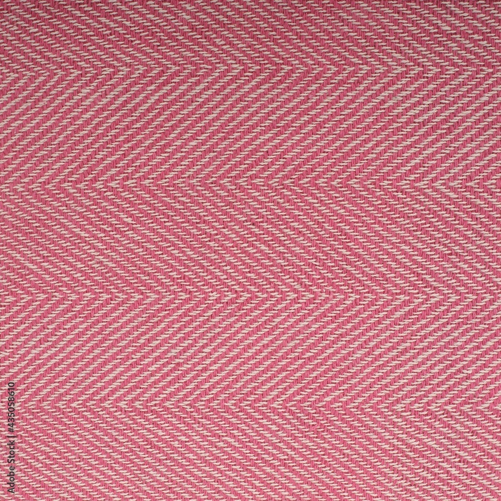 Fototapeta premium Pink upholstery fabric texture with chevron pattern