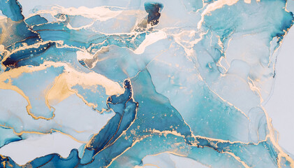 Abstract liquid ink painting background in pastel colors with gold splashes
