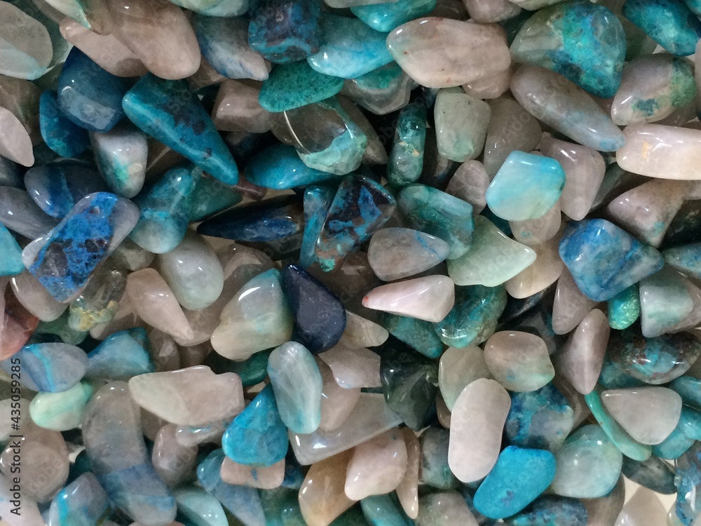 Small blue green gemstone chips for background Small blue green gemstone chips for background