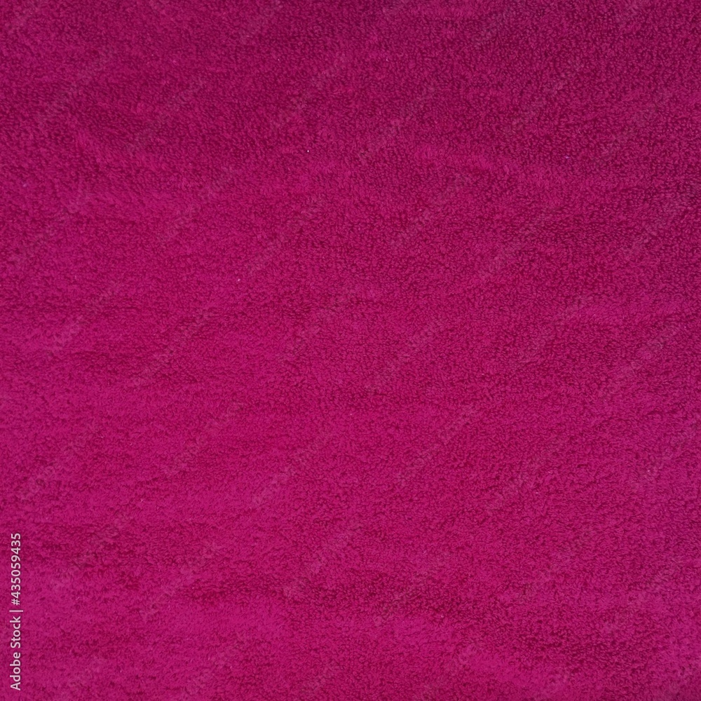 Fototapeta premium Terry towel texture in magenta color.jpg