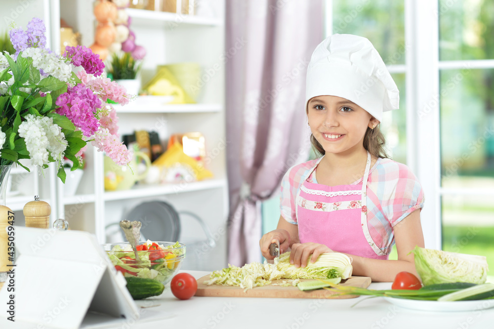 Cute girl preparing delicious fresh salad Cute girl preparing delicious fresh salad