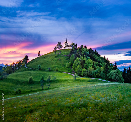 Photographie Sveti Jakob hill with a church on top, Central Slovenia region