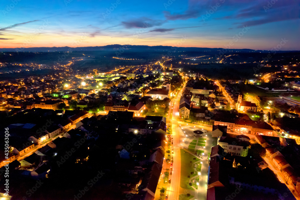 Colorful medieval town of Krizevci historic center aerial night view