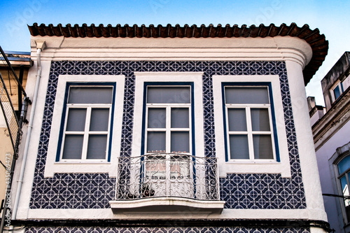 Old colorful typical facade next to the water canal in Aveiro village in Porto