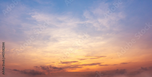 The peaceful morning sky before sunrise and clouds with sunlight.