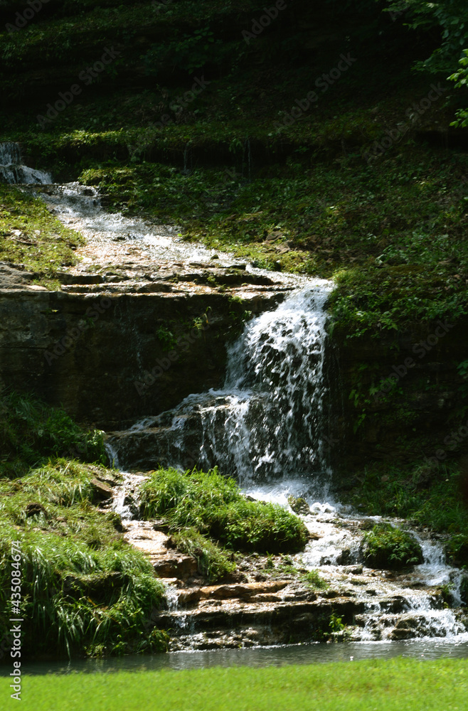 A beautiful waterfall in a stream