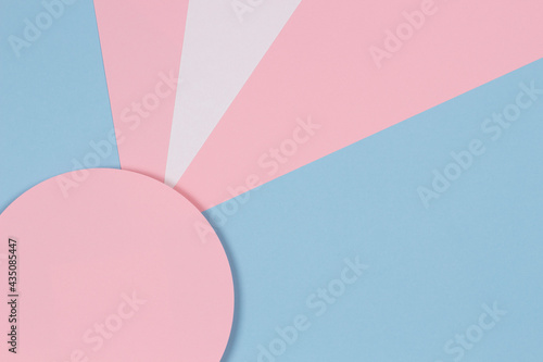 Abstract geometric pastel color paper texture background with light blue, pink and white colors photo