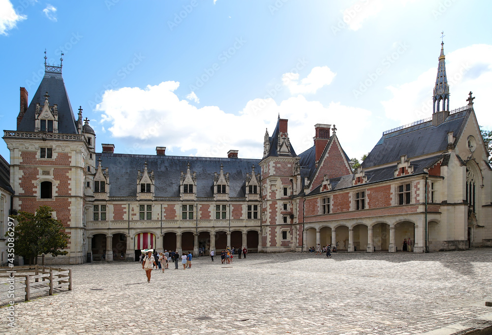 Fototapeta premium Blois Royal Castle, France. View from the courtyard of the palace of Louis XII and the chapel of Saint-Calais 