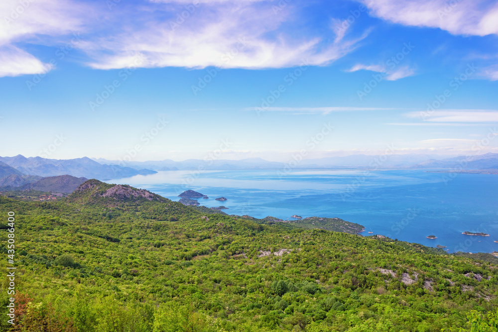 Fototapeta premium Beautiful Mediterranean landscape with lake on sunny spring day. National Park Lake Skadar, Montenegro