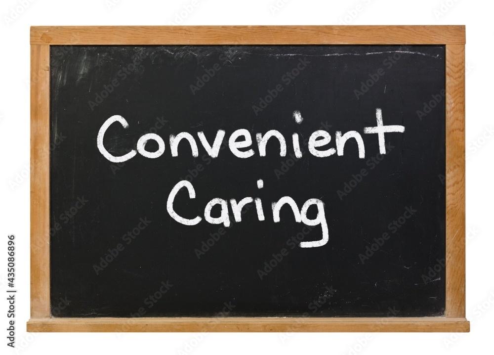 Convenient caring written in white chalk on a black chalkboard isolated on white Convenient caring written in white chalk on a black chalkboard isolated on white