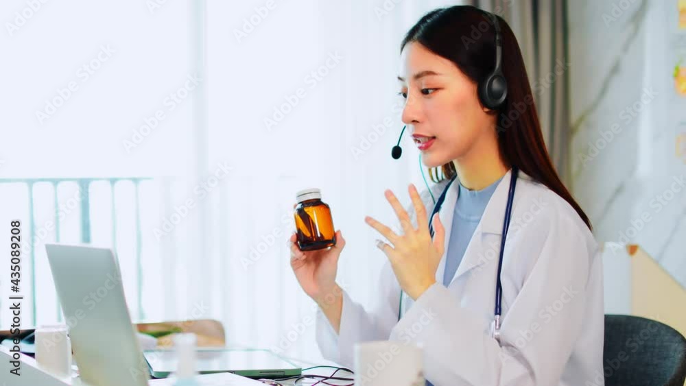 Portrait of young asian woman doctor with white coat standing in hospital.Telemedicine, Medical online, health concept. Doctor using laptop for work. Portrait of young asian woman doctor with white coat standing in hospital.Telemedicine, Medical online, health concept. Doctor using laptop for work.