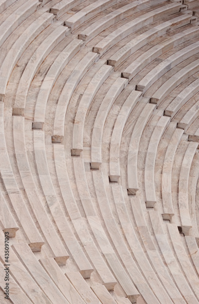 Seats of old greek theater and democracy stand.