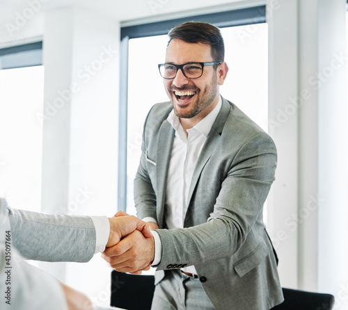 Картината върху платно business man office work hand shaking meeting agreement offer handshake greeting