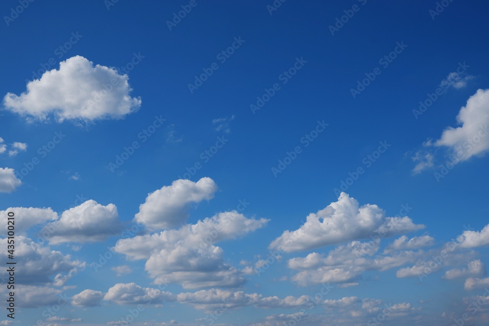 Blue sky and white clouds on natural daylight background Blue sky and white clouds on natural daylight background