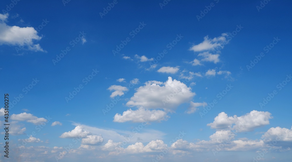 Blue sky and white clouds on natural daylight background Blue sky and white clouds on natural daylight background