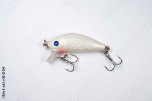 Plastic fishing lure on a white background. Home made fishing lure. 