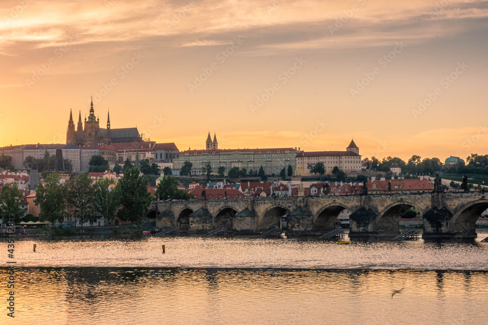 PRAGUE, CZECH REPUBLIC, 31 JULY 2020: Amazing sunset over the castle of Prague and the Vltava river