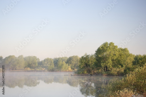 Light morning fog over the Staritsa River in late spring