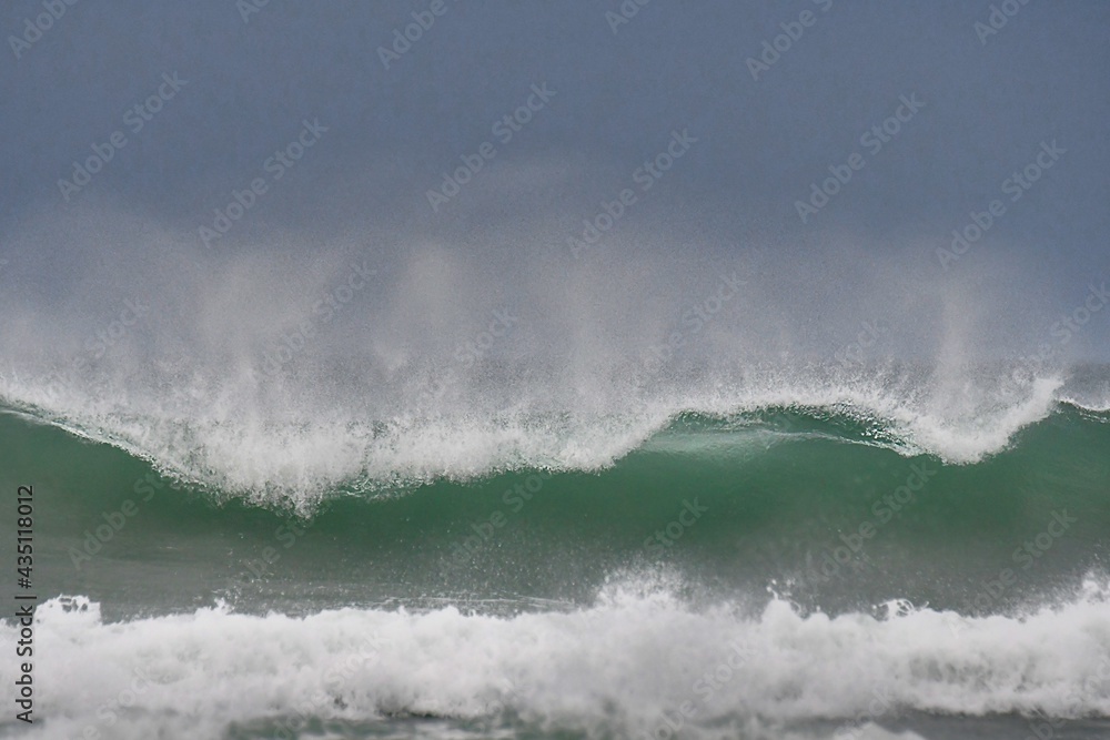 Beautiful waves on the coast in Brittany. France Beautiful waves on the coast in Brittany. France