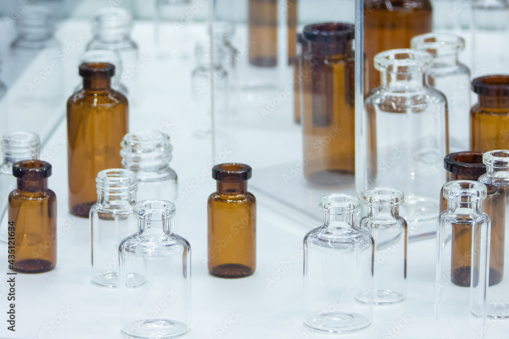 Group of empty medicine glass bottles, low-grip Group of empty medicine glass bottles, low-grip