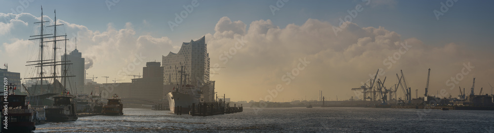 Panorama in the morning at the landungsbrücken in hamburg with elbphilharmonie concert hall 
