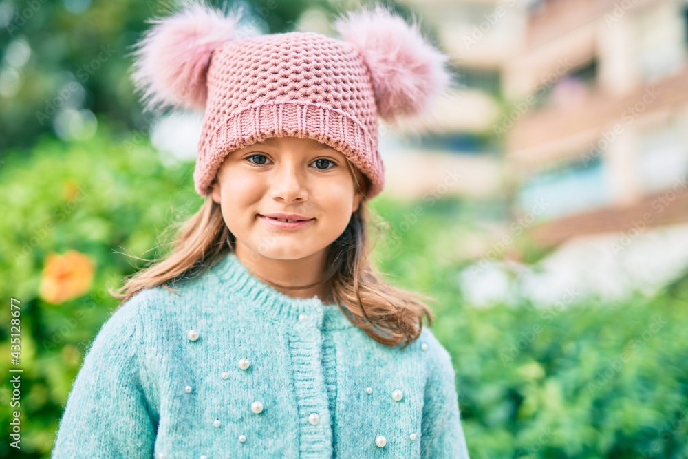 Adorable caucasian child girl smiling happy standing at the park. Adorable caucasian child girl smiling happy standing at the park.