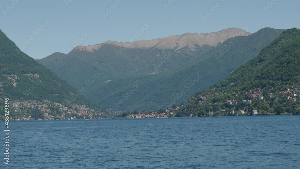 panoramic view of the Como lake from the boat while sailing panoramic view of the Como lake from the boat while sailing