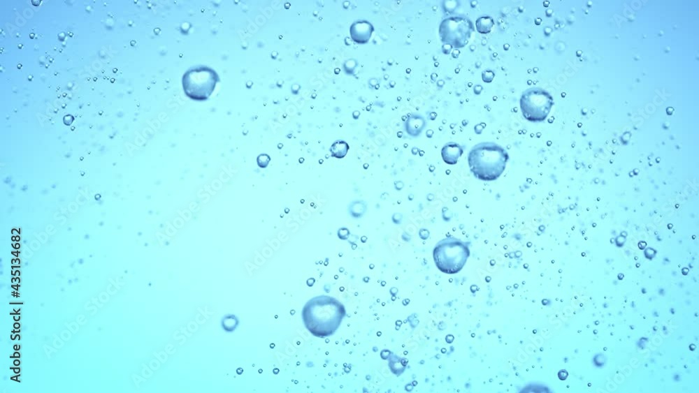Super Slow Motion Shot of Rising Various Bubbles in Water on Light Blue Background at 1000 fps. Super Slow Motion Shot of Rising Various Bubbles in Water on Light Blue Background at 1000 fps.