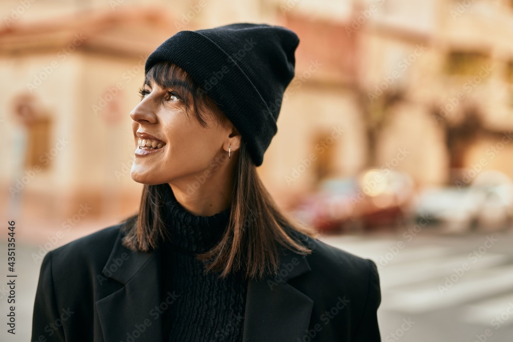 Young hispanic woman smiling happy standing at the city. Young hispanic woman smiling happy standing at the city.