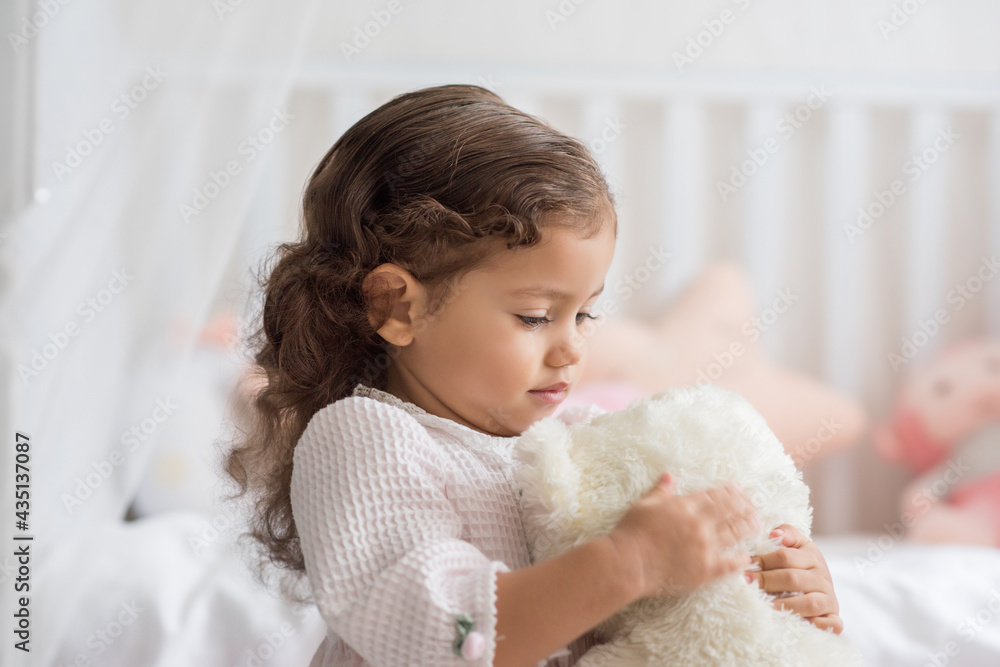 Girl in pajamas drawing and smiling coloring and painting Girl in pajamas drawing and smiling coloring and painting