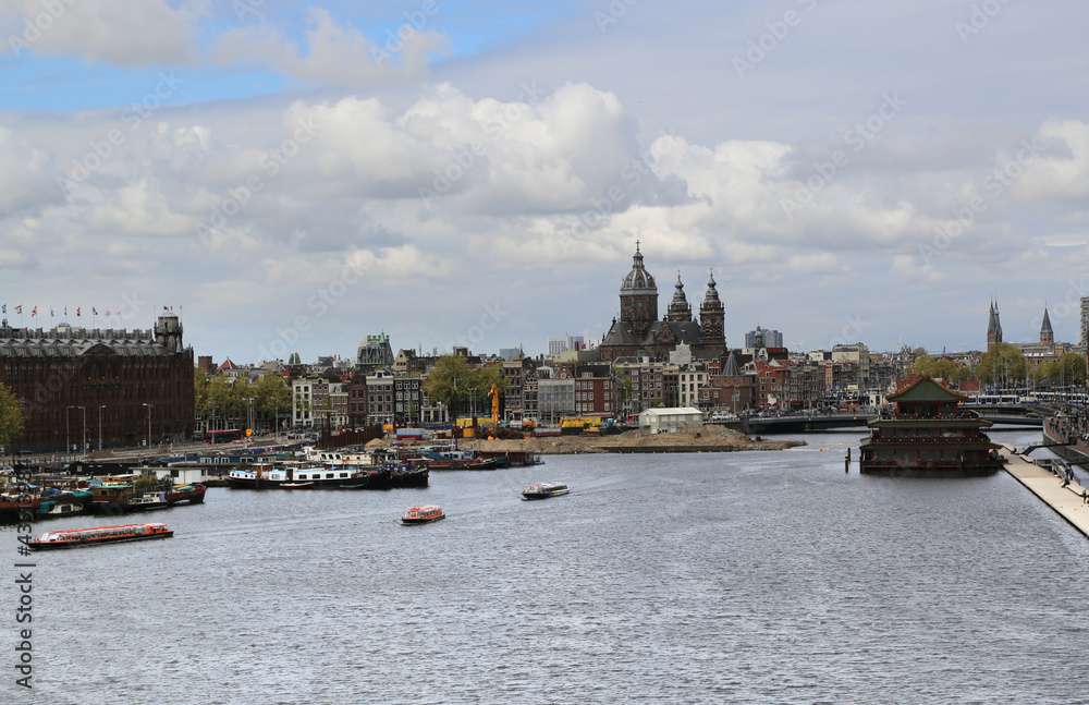 View of the city of Amsterdam with its water canals View of the city of Amsterdam with its water canals