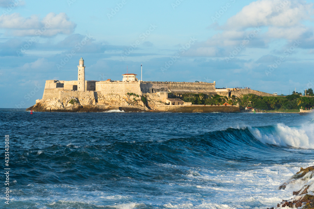El Morro spanish fortress with lighthouse, cannons and cuban flag in th  foreground, with sea in the background, Havana, Cuba 18835008 Stock Photo  at Vecteezy