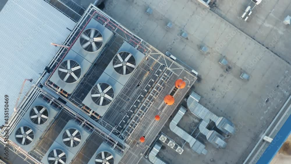 Heating, ventilation and air conditioning systems installed on a rooftop. Aerial top down view