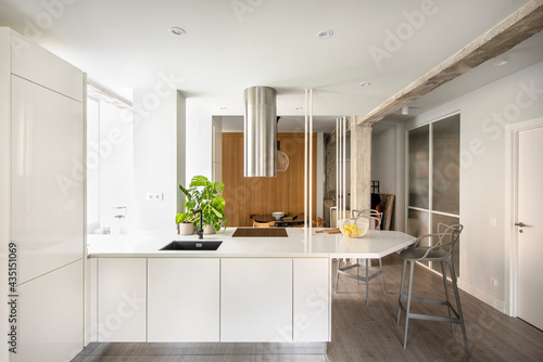 Image of white kitchen island in apartment