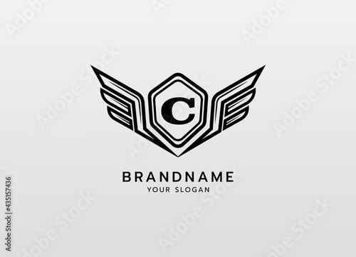 Letter C logotype in hexagon with two wings emblem