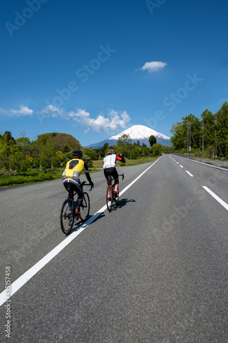 Riders enjoying cycling towards the mountain