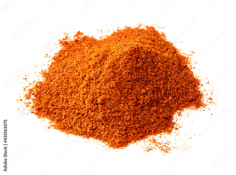pile of chili powder from cayenne pepper on white pile of chili powder from cayenne pepper on white