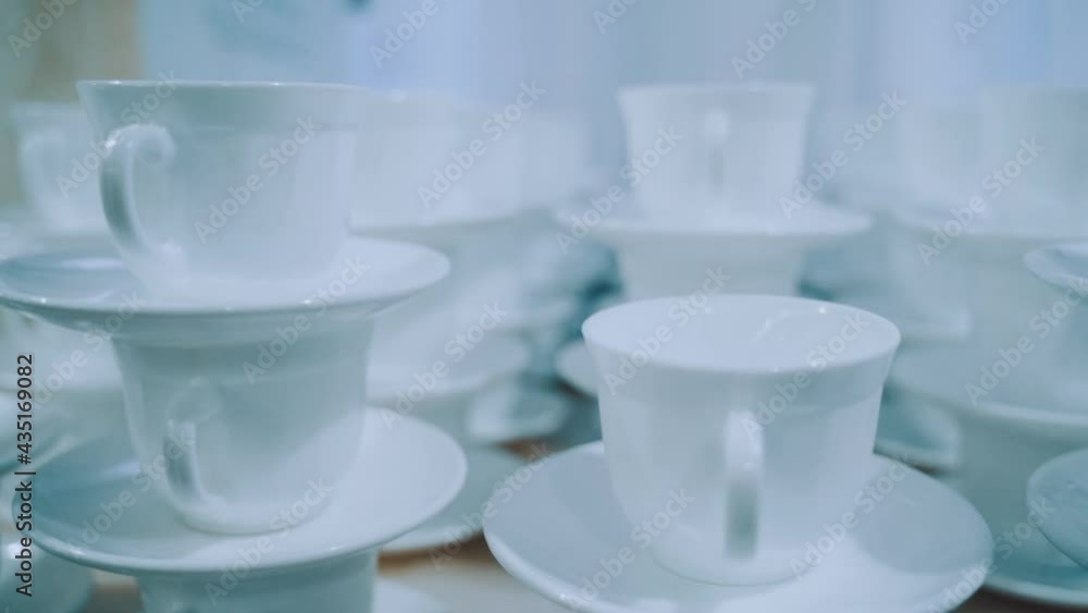 Clean cups and saucers in the restaurant Clean cups and saucers in the restaurant