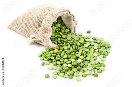 organic green split peas filling in sack bag.