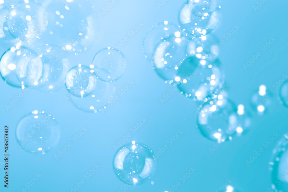 Freshness Natural with Transparent Soap Bubbles Float on blue Background