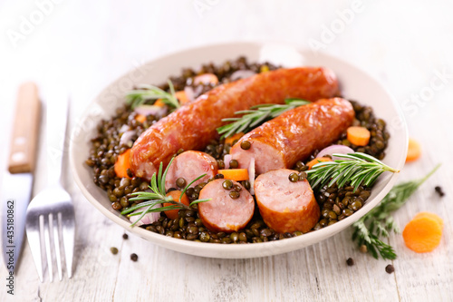 Fototapeta Naklejka Na Ścianę i Meble -  lentils with carrot and sausage