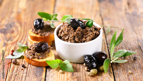 black olive spread and bread toast- tapenade