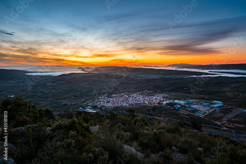 Foggy landscape at dawn. Elevated view of La Font de la Figuera  Valencia  Spain