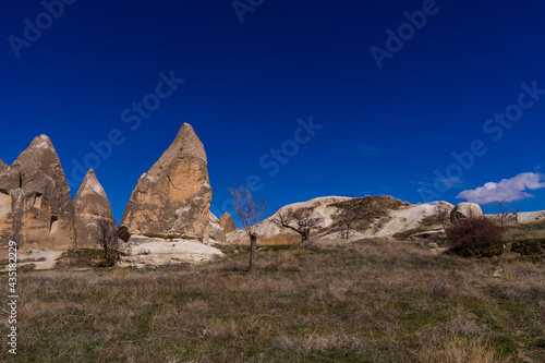 Panoramic view of fairy chimneys and typical rock formations near Göreme, Cappadocia, Turkey
