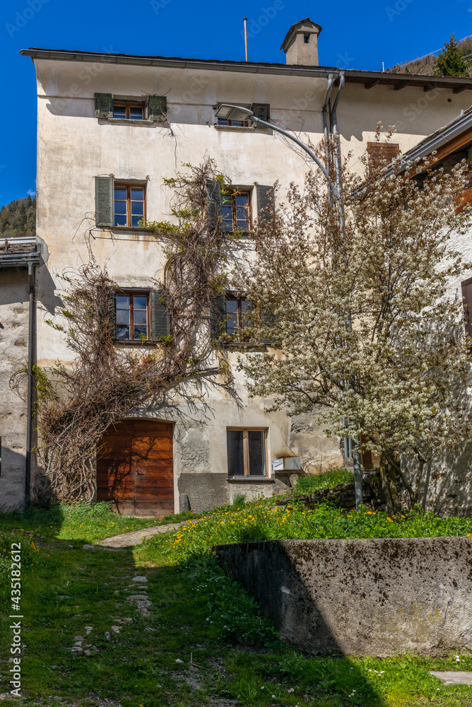 View of the old houses in the alpine village of Poschiavo in Switzerland during spring