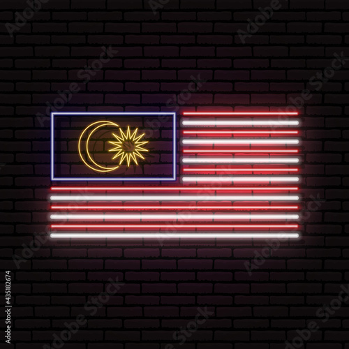 Neon sign in the form of the flag of Malaysia. Against the background of a brick wall with a shadow. For the design of tourist or patriotic themes.