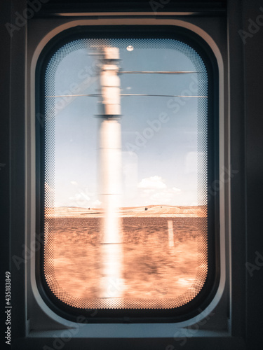 the view from the window of a running train