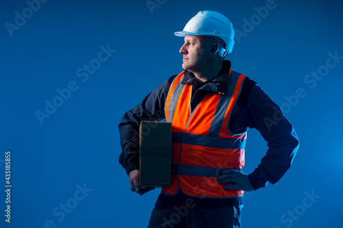 Man in a work uniform. Work...