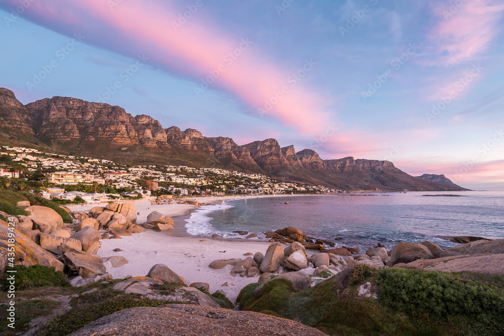 Obraz premium Camps Bay Beach at sunset in Cape Town, South Africa.