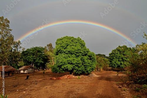 The Rainbow after the storm. Mahamasina village. Anharama National Park. Madagascar. photo